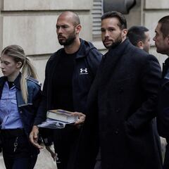 How long have Andrew Tate and his brother been in prison in Romania? What are they accused of?