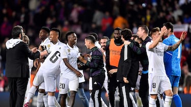 Real Madrid's players celebrate at the end of the Copa del Rey (King's Cup) semi-final second leg football match between FC Barcelona and Real Madrid CF at the Camp Nou stadium in Barcelona on April 5, 2023. (Photo by Pau BARRENA / AFP)