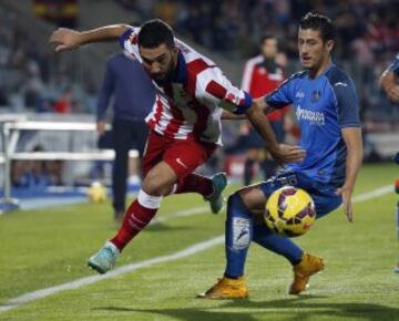 Arda Turan y Sergio Escudero