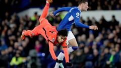 LIVERPOOL, ENGLAND - JANUARY 03: Kaoru Mitoma of Brighton and Hove Albion is brought down by Nathan Patterson of Everton during the Premier League match between Everton FC and Brighton & Hove Albion at Goodison Park on January 3, 2023 in Liverpool, United Kingdom. (Photo by Richard Sellers/Getty Images)