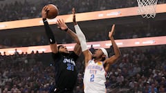 DALLAS, TEXAS - MAY 18: Daniel Gafford #21 of the Dallas Mavericks shoots the ball against Shai Gilgeous-Alexander #2 of the Oklahoma City Thunder during the first quarter in Game Six of the Western Conference Second Round Playoffs at American Airlines Center on May 18, 2024 in Dallas, Texas. NOTE TO USER: User expressly acknowledges and agrees that, by downloading and or using this photograph, User is consenting to the terms and conditions of the Getty Images License Agreement.   Sam Hodde/Getty Images/AFP (Photo by Sam Hodde / GETTY IMAGES NORTH AMERICA / Getty Images via AFP)
