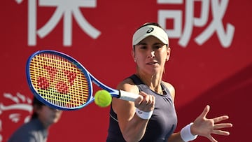 Switzerland's Belinda Bencic hits a return to China's Wang Yafan during their women's singles match in the Hong Kong Tennis Open in Hong Kong on October 30, 2025. (Photo by Peter PARKS / AFP)