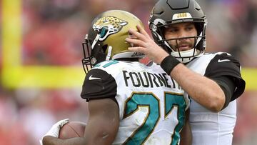 SANTA CLARA, CA - DECEMBER 24: Leonard Fournette #27 of the Jacksonville Jaguars is congratulated by Blake Bortles #5 after Fournette scored on a 1-yard touchdown run against the San Francisco 49ers during their NFL football game at Levi&#039;s Stadium on December 24, 2017 in Santa Clara, California.   Thearon W. Henderson/Getty Images/AFP
 == FOR NEWSPAPERS, INTERNET, TELCOS &amp; TELEVISION USE ONLY ==