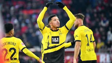 Dortmund's British midfielder #10 Jadon Sancho reacts during the German first division Bundesliga football match between FC Cologne and Borussia Dortmund in Cologne on January 20, 2024. (Photo by Uwe KRAFT / AFP) / DFL REGULATIONS PROHIBIT ANY USE OF PHOTOGRAPHS AS IMAGE SEQUENCES AND/OR QUASI-VIDEO