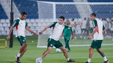 DOHA, QATAR - NOVEMBER 21: Luis Romo, Raul Jimenez and Roberto Alvarado of Mexico interact during the Mexico Training Session at  on November 21, 2022 in Doha, Qatar. (Photo by Khalil Bashar/Jam Media/FIFA via Getty Images)