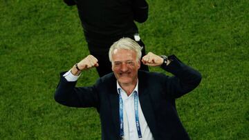 France's coach Didier Deschamps celebrates at the end of the Russia 2018 World Cup semi-final football match between France and Belgium at the Saint Petersburg Stadium in Saint Petersburg on July 10, 2018. / AFP PHOTO / Adrian DENNIS / RESTRICTED TO EDITORIAL USE - NO MOBILE PUSH ALERTS/DOWNLOADS