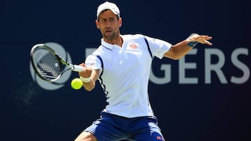 TORONTO, ON - JULY 27: Novak Djokovic of Serbia plays a shot against Gilles Muller of Luxembourg on Day 3 of the Rogers Cup at the Aviva Centre on July 27, 2016 in Toronto, Ontario, Canada.   Vaughn Ridley/Getty Images/AFP
 == FOR NEWSPAPERS, INTERNET, TELCOS &amp; TELEVISION USE ONLY ==