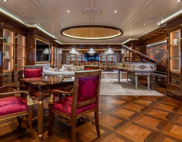 Take a look at this 350-foot yacht with infinity pool, cinema and gym the Department of Justice is selling