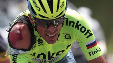 Spain's Alberto Contador is seen injured after a crash during the 188 km first stage of the 103rd edition of the Tour de France