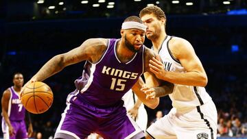 Nov 27, 2016; Brooklyn, NY, USA; Sacramento Kings center center DeMarcus Cousins (15) dribbles the ball as Brooklyn Nets center Brook Lopez (11) defends during the first half at Barclays Center. Mandatory Credit: Andy Marlin-USA TODAY Sports