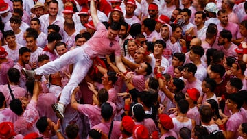 Revellers participate in the opening of the San Fermin festival (Chupinazo) in Pamplona, Spain, July 6, 2024. REUTERS/Susana Vera