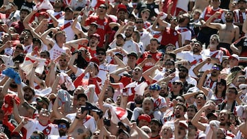 Supporters of River Plate cheer during the Argentina first division Superliga football tournament match against Rosario Central, at the Monumental stadium in Buenos Aires, on November 10, 2019. (Photo by Alejandro PAGNI / AFP)