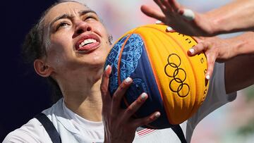 US' #05 Dearica Hamby fights for the ball in the women's pool round 3x3 basketball game between the USA and Canada during the Paris 2024 Olympic Games at La Concorde in Paris on August 2, 2024. (Photo by David GRAY / AFP)
