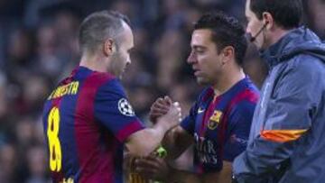 Iniesta y Xavi