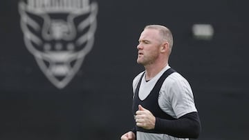 D.C. United forward Wayne Rooney jogs on the field as part of training at RFK Auxiliary Field. Mandatory Credit: Geoff Burke-USA TODAY Sports