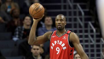 CHARLOTTE, NORTH CAROLINA - JANUARY 08: Serge Ibaka #9 of the Toronto Raptors watches on against the Charlotte Hornets during their game at Spectrum Center on January 08, 2020 in Charlotte, North Carolina. NOTE TO USER: User expressly acknowledges and agrees that, by downloading and or using this photograph, User is consenting to the terms and conditions of the Getty Images License Agreement. Streeter Lecka/Getty Images/AFP
== FOR NEWSPAPERS, INTERNET, TELCOS & TELEVISION USE ONLY ==
