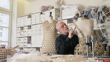 Fashion designer Paco Rabanne works on an outfit in his Paris workshop. (Photo by Eric Robert/Sygma/Sygma via Getty Images)