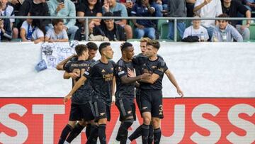 Arsenal's Brazilian midfielder Marquinhos (C) is congratulated by teammates after scoring a goal during the UEFA Europa League Group A football match between FC Zurich and Arsenal at Arena St. Gallen Stadium in St. Gallen on September 8, 2022. (Photo by URS BUCHER / AFP) (Photo by URS BUCHER/AFP via Getty Images)