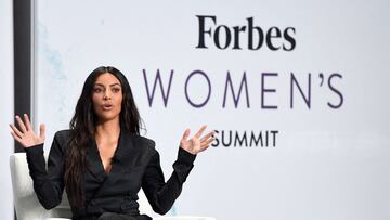 (FILES) In this file photo taken on June 13, 2017, Kim Kardashian speaks with Steve Forbes at the 2017 Forbes Women's Summit at Spring Studios in New York City. - Reality television star, influencer and business owner Kim Kardashian West is officially a billionaire, according to an estimate from Forbes, making her debut on the exclusive global list only one year after her younger sister Kylie Jenner fell off of it. Kardashian West's money comes from TV income and endorsement deals, according to the magazine, as well as her two lifestyle brands. (Photo by ANGELA WEISS / AFP)