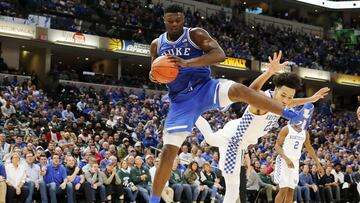 Nov 6, 2018; Indianapolis, IN, USA; Duke Blue Devils forward Zion Williamson (1) grabs a rebound against Kentucky Wildcats forward EJ Montgomery (23) in the second half during the Champions Classic at Bankers Life Fieldhouse. Mandatory Credit: Brian Spurlock-USA TODAY Sports