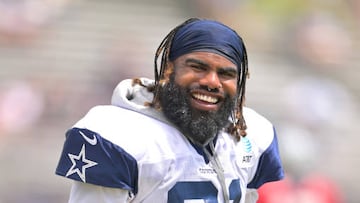 OXNARD, CA - AUGUST 01: Running back Ezekiel Elliott #21 of the Dallas Cowboys warms up during training camp drills at River Ridge Fields on August 1, 2022 in Oxnard, California. (Photo by Jayne Kamin-Oncea/Getty Images)