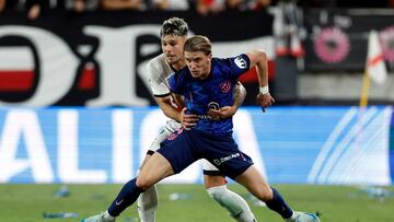 Gallagher, con De Frutos en Vallecas.