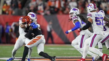 CINCINNATI, OHIO - JANUARY 02: Damar Hamlin #3 of the Buffalo Bills tackles Tee Higgins #85 of the Cincinnati Bengals during the first quarter at Paycor Stadium on January 02, 2023 in Cincinnati, Ohio. Hamlin was taken off the field by medical personnel following the play.   Dylan Buell/Getty Images/AFP (Photo by Dylan Buell / GETTY IMAGES NORTH AMERICA / Getty Images via AFP)