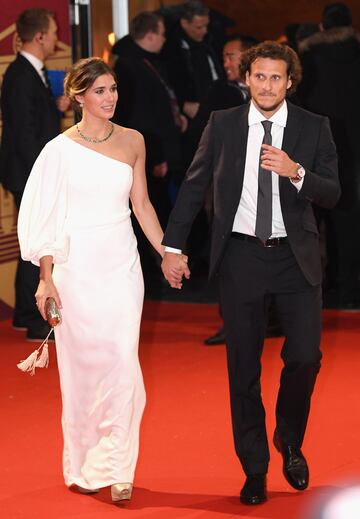 Diego Forlán and his wife Paz Cardoso flew the flag for Uruguay.