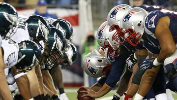 FILE - In this Dec. 6, 2015, file photo, the New England Patriots, right, and the Philadelphia Eagle get set for the snap at the line of scrimmage during an NFL football game at Gillette Stadium in Foxborough, Mass.
  The two teams are set to meet in Super Bowl 52 on Sunday, Feb. 4, 2018, in Minneapolis. (Winslow Townson/AP Images for Panini via AP, File)