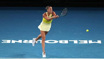 Belarus' Aryna Sabalenka hits a shot against Spain's Paula Badosa during their women's singles semi-final match on day twelve of the Australian Open tennis tournament in Melbourne on January 23, 2025. (Photo by Adrian Dennis / AFP) / -- IMAGE RESTRICTED TO EDITORIAL USE - STRICTLY NO COMMERCIAL USE --