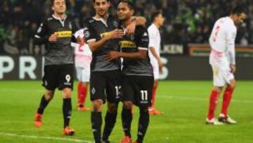 Raffael celebra su tercer gol con Stindl.