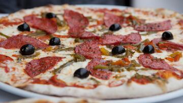 France, French Riviera, Provence, Mediterranean, French Food, Food, Food And Drink, Pizza, Mediterranean Pizza, Black Olive, Olive, Pepperoni, Chorizo, Roasted Pepper, Bell Pepper, Roasted Bell Pepper, Flour, Crust, Thin Crust, Cheese, Mozzarella Cheese, Baked,