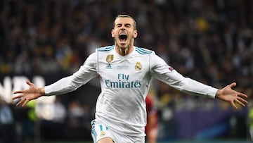 (FILES) In this file photo taken on May 26, 2018 Real Madrid's Welsh forward Gareth Bale celebrates after scoring his team's second goal during the UEFA Champions League final football match between Liverpool and Real Madrid at the Olympic Stadium in Kiev. - Gareth Bale announced his retirement from club and international football on January 9, 2023, bringing to an end one of the most decorated careers in British football history. (Photo by FRANCK FIFE / AFP)