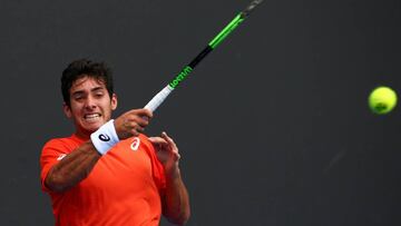 MELBOURNE, AUSTRALIA - JANUARY 15: Christian Garin of Chile plays a forehand in his first round match against David Goffin of Belgium during day two of the 2019 Australian Open at Melbourne Park on January 15, 2019 in Melbourne, Australia.  (Photo by Mike