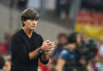 Germany boss Joachim Loew looks on.