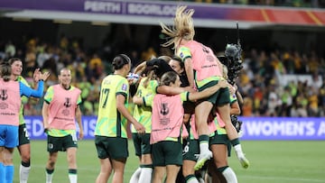 Australia's players celebrate after their victory during the AFC Women's Asian Cup Australia 2026 football match between Australia and North Korea in Perth on March 13, 2026. (Photo by Antony DICKSON / AFP) / --IMAGE RESTRICTED TO EDITORIAL USE - STRICTLY NO COMMERCIAL USE--