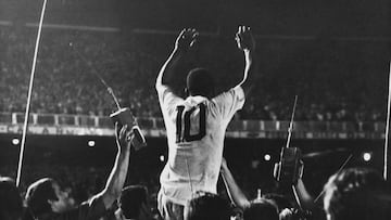 Pele is lifted up by his Santos team mates after scoring the 1,000th goal of his career during a game against Vasco da Gama at the Maracana Stadium, Rio de Janeiro, Brazil, 19th November 1969. (Photo by Pictorial Parade/Archive Photos/Getty Images)