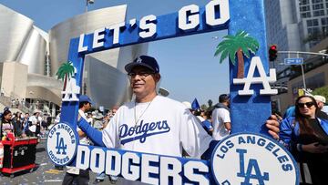 LOS ANGELES, CALIFORNIA - NOVEMBER 03: A fan poses for a photograph during the Los Angeles Dodgers 2025 World Series Championship parade on November 03, 2025 in Los Angeles, California. Kevork Djansezian/Getty Images/AFP (Photo by KEVORK DJANSEZIAN / GETTY IMAGES NORTH AMERICA / Getty Images via AFP)