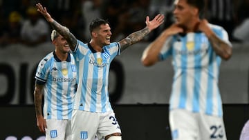 Racing's midfielder #36 Bruno Zuculini (C) celebrates with teammates after scoring during the Recopa Sudamericana second leg final football match between Brazil's Botafogo and Argentina's Racing at the Nilton Santos Olympic Stadium in Rio de Janeiro, Brazil, on February 27, 2025. (Photo by Pablo PORCIUNCULA / AFP)