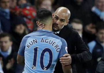 Manchester City's Sergio Aguero getting some advice from manager Pep Guardiola.