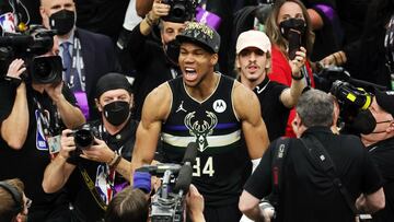 MILWAUKEE, WISCONSIN - JULY 20: Giannis Antetokounmpo #34 of the Milwaukee Bucks celebrates defeating the Phoenix Suns in Game Six to win the 2021 NBA Finals at Fiserv Forum on July 20, 2021 in Milwaukee, Wisconsin. NOTE TO USER: User expressly acknowledges and agrees that, by downloading and or using this photograph, User is consenting to the terms and conditions of the Getty Images License Agreement.   Jonathan Daniel/Getty Images/AFP
 == FOR NEWSPAPERS, INTERNET, TELCOS &amp; TELEVISION USE ONLY ==