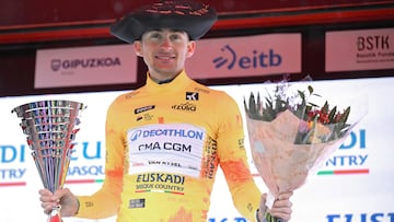 Overall race leader Team Decathlon CMA CGM's French rider Paul Seixas celebrates winning the 2026 Basque Country's Itzulia cycling tour after the sixth and last stage, in Bergara, on April 11, 2026. (Photo by ANDER GILLENEA / AFP)