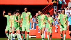 Los jugadores del Málaga, celebrando el 0-1, obra de Dioni.