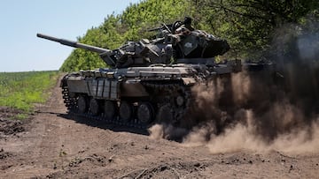 A Ukrainian serviceman rides atop a tank near a position in Donetsk region, as Russia's attack on Ukraine continues, Ukraine June 11, 2022. Picture taken June 11, 2022. REUTERS/Stringer