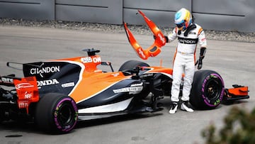 MONTREAL, QC - JUNE 09: Fernando Alonso of Spain and McLaren Honda climbs out of his car after stopping on track during practice for the Canadian Formula One Grand Prix at Circuit Gilles Villeneuve on June 9, 2017 in Montreal, Canada.   Clive Mason/Getty Images/AFP
 == FOR NEWSPAPERS, INTERNET, TELCOS &amp; TELEVISION USE ONLY ==