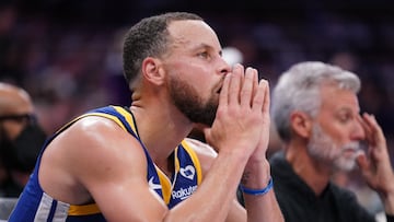Apr 16, 2024; Sacramento, California, USA; Golden State Warriors guard Stephen Curry (30) sits on the bench during action against the Sacramento Kings in the fourth quarter during a play-in game of the 2024 NBA playoffs at the Golden 1 Center. Mandatory Credit: Cary Edmondson-USA TODAY Sports