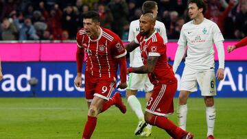 Soccer Football - Bundesliga - Bayern Munich vs Werder Bremen - Allianz Arena, Munich, Germany - January 21, 2018   Bayern Munich&#039;s Robert Lewandowski celebrates scoring their second goal with Arturo Vidal    REUTERS/Michaela Rehle    DFL RULES TO LI