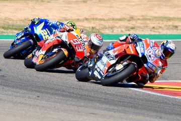 Andrea Dovizioso, Marc M芍rquez y Andrea Iannone.