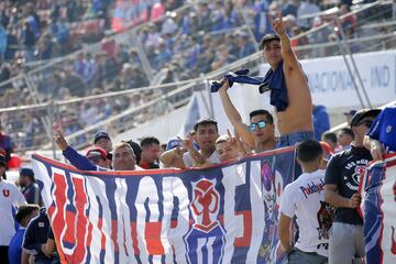 Hinchas de Universidad de Chile asisten al partido de primera division contra Colo Colo disputado en el estadio Nacional de Santiago, Chile.