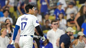 Sep 6, 2024; Los Angeles, California, USA; Los Angeles Dodgers designated hitter Shohei Ohtani (17) looks back at a bases loaded double play to end the eighth inning against the Cleveland Guardians at Dodger Stadium. Mandatory Credit: Jayne Kamin-Oncea-Imagn Images